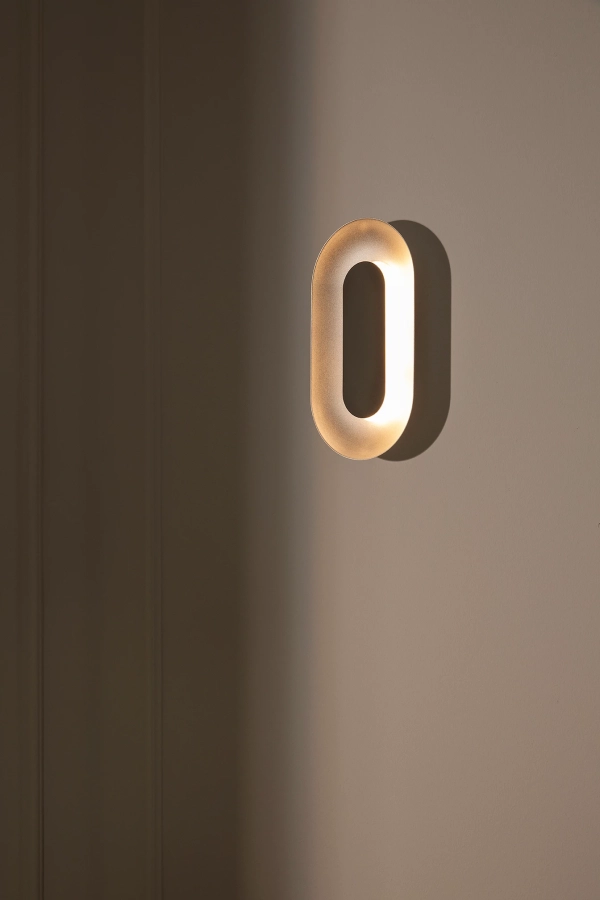nuura-sasi-small-silver-oval-wall-lamp-decorative-light.jpg.webp