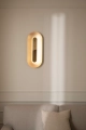 nuura-rick-tegelaar-sasi-large-brass-wall-lamp-closeup.jpg.webp
