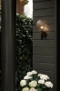 nuura-miira-wall-outdoor-porch-lighting-black-optic-aw22.jpg.webp