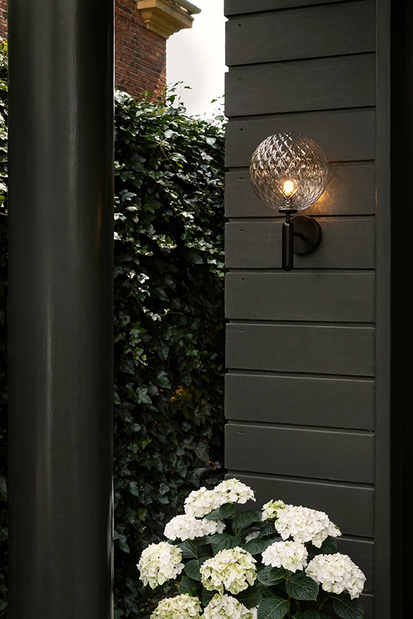 nuura-miira-wall-outdoor-porch-lighting-black-optic-aw22.jpg.webp