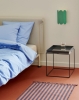 Tamoto Bed Metaphor 030 headboard_bone powder coated frame_Tray Table M deep blue_Arcs Sconce sea green.jpg