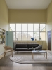 outline-3-seater-refine-leather-black-cover-lounge-couple-wavy-light-blue-oak-relevo-off-white-muuto-org_3.jpg