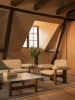 Audo_Brasilia_Sofa_Lounge_Table_Chair_Low_Back_Duomo_Rug_1.webp
