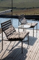 Traverse Lounge Armchair heat treated oiled ash_Traverse Quilted Seat Cushion beige sand textile_Pyro Coffee Table 01.jpg