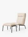 Muno Lounge Chair LN16_Warm Black Legs w. Cifrado 0221_Muno Footstool LN20_Dark Chrome Legs w. Cifrado 0221_Angled Front.jpg
