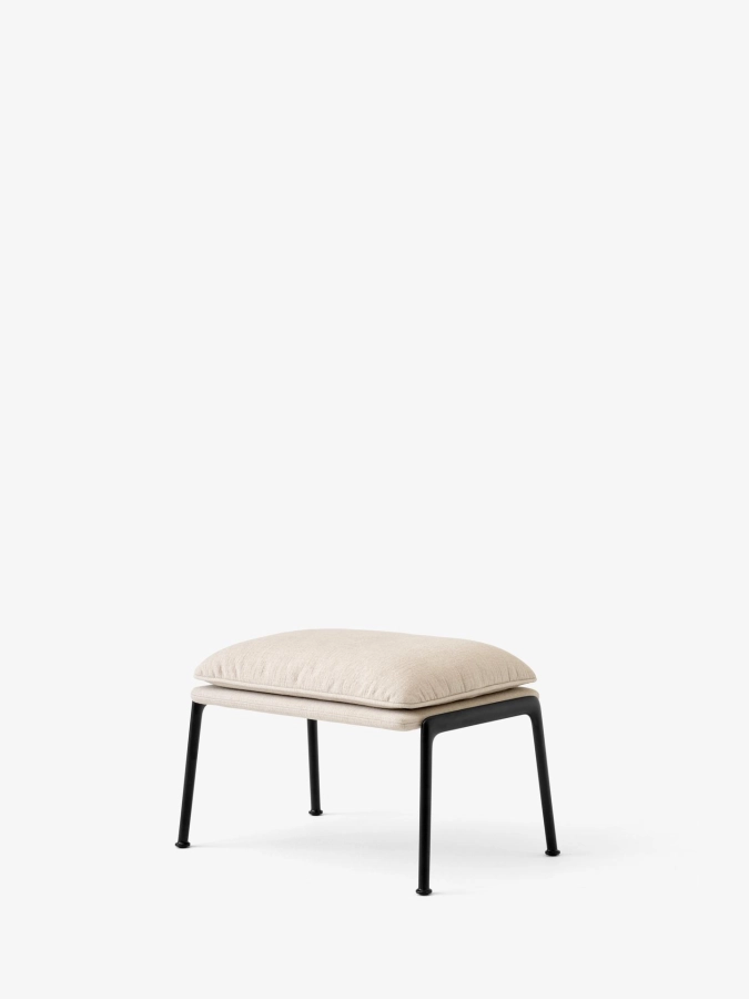 Muno Footstool LN20_Warm Black Legs w. Cifrado 0221_Angled Front.jpg