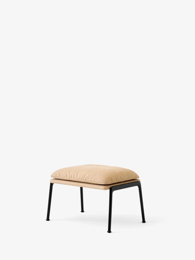 Muno Footstool LN20_Warm Black Legs w. Clay 0007_Angled Front.jpg