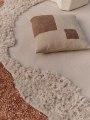 FermLiving_SS25_OleoCushion_NaturalSugarKelp_1104270904_1104270908_NorteOutdoorRug_Natural_1104270893.jpg