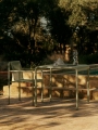 FermLiving_SS25_DappleTable_80x80_TeaGreen_1104270689_DappleChairWithArms_TeaGreen_1104270685.jpg
