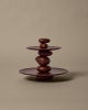 FermLiving_SS25_PackshotsWithBackground_PebbleDessertStand_DarkBrown_1104271008.jpg