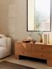 FermLiving_SS25_KubenDrawers_2x2_NaturalOakVeneer_1104271234_SolSaladBowl_SugarKelp_1104270710_OesteTableLamp_Sand_1104271077_MuroVase_H23_RecycledAmber_1104270743.jpg