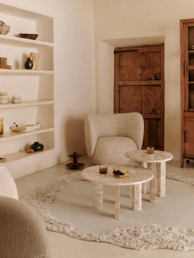 FermLiving_SS25_RicoLoungeChair_Utzon-CanLis_SandOff-white_1104270751_1104271707_NorteOutdoorRug_Natural_1104270893_TaulaSideTable_Sand_1104270180_1104270185.jpg