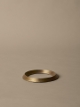 FermLiving_SS25_PackshotsWithBackground_LeveeTrivet_AntiqueBrass_1104270875.jpg