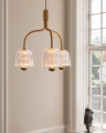 Nuura_Asteea_3_Satin_brass_-_rippled_clear_lifestyle_2.jpg.webp