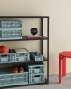 HAY Colour Crate dusty blue collection_New Order Shelving System charcoal_Table Clock white_Rey Stool scarlet red wb lacquer beech.jpg