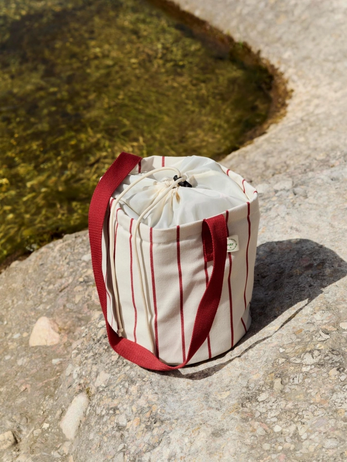 Outdoor Market Bottle Bag M beige with red stripe.jpg